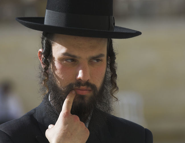 Close-up of rabbi wearing hat