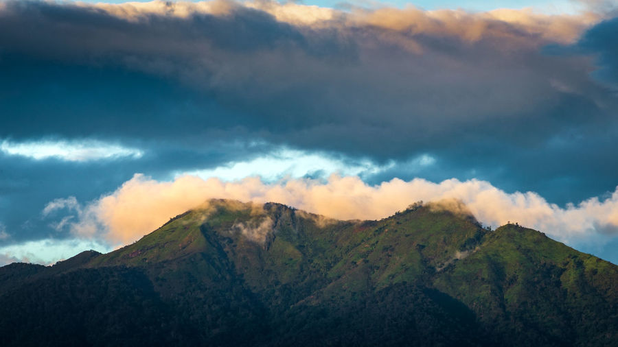 Scenic view of mountains against sky during sunset