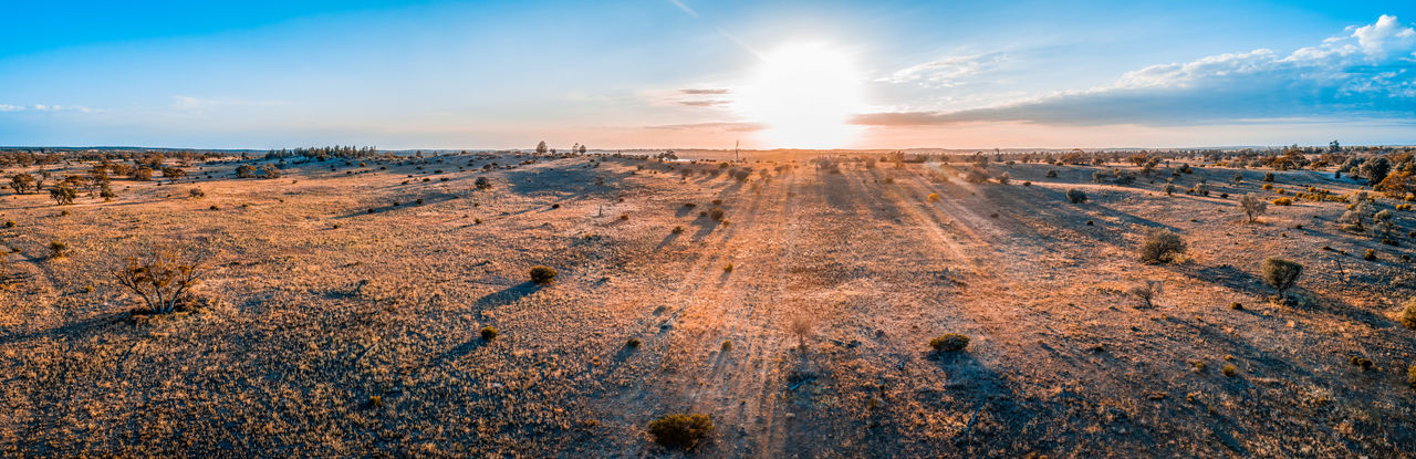 Panoramic view of landscape against sky during sunset