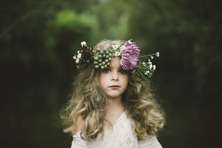 Portrait of girl wearing floral crown