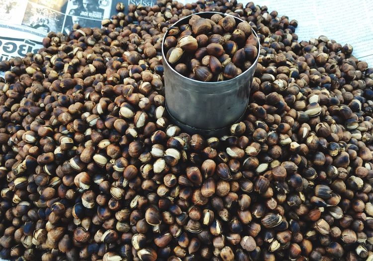 High angle view of roasted chestnuts for sale