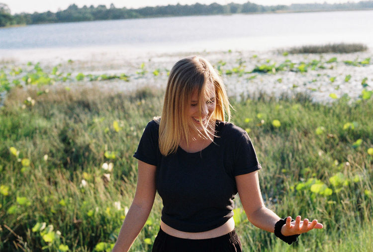 Woman standing on field