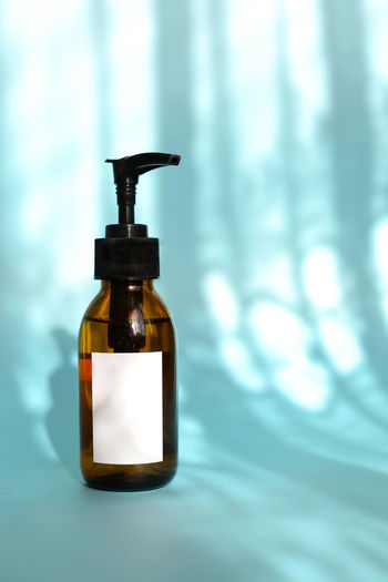 Close-up of essential oil in bottle