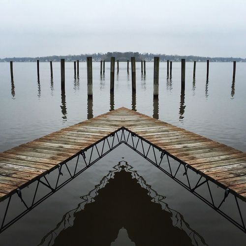 Wooden posts in the sea