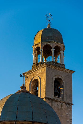Low angle view of cathedral against clear blue sky