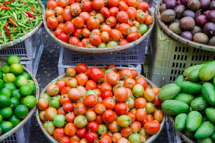 Fresh vegetables and fruits in baskets on street market. local morning market, luang prabang, laos.