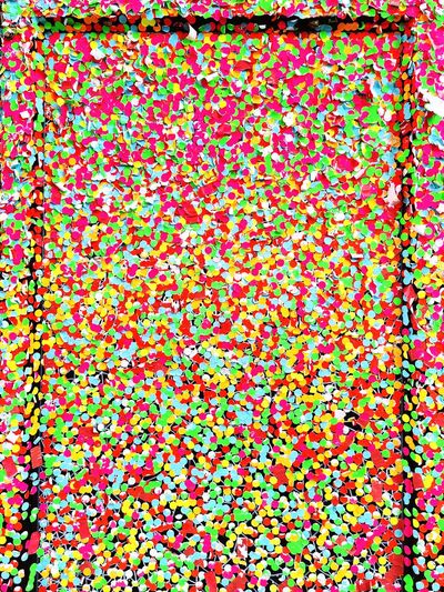 Full frame shot of multi colored dots stickers background