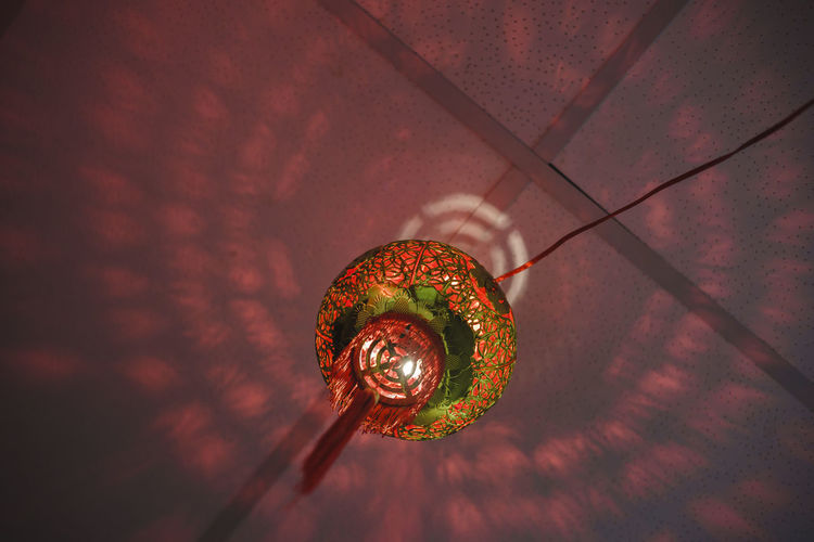 Close-up low angle view of illuminated lantern