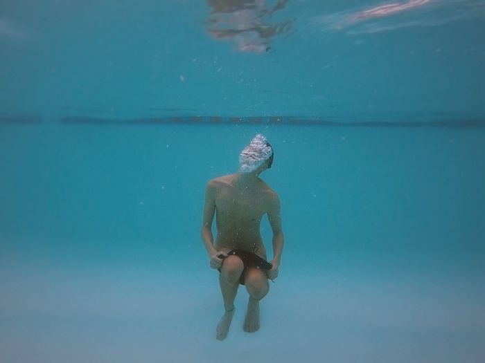 Man swimming in sea