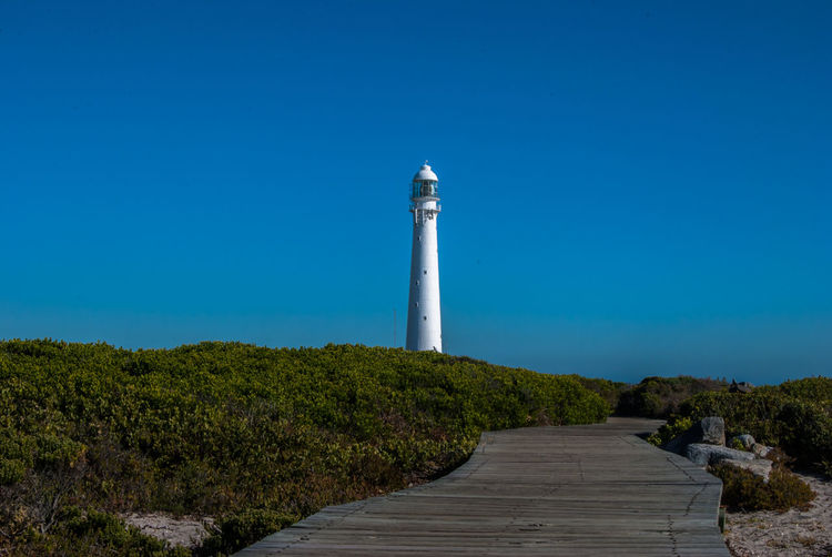View of lighthouse against blue sky