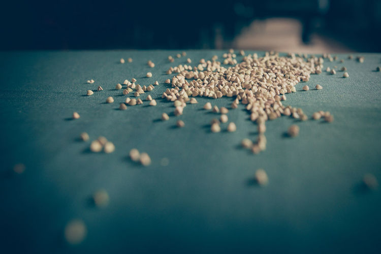 Close-up of dried food spilling on table