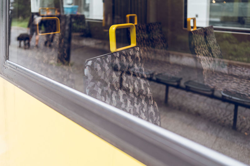 Yellow train seen through window