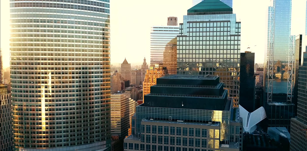 Modern buildings in city against sky