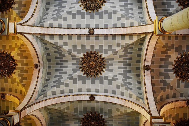 Low angle view of church ceiling
