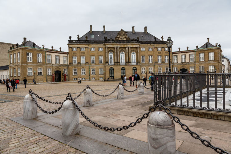 Group of people in front of the palaces of amalienborg