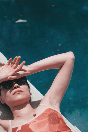 Portrait of woman swimming in sea