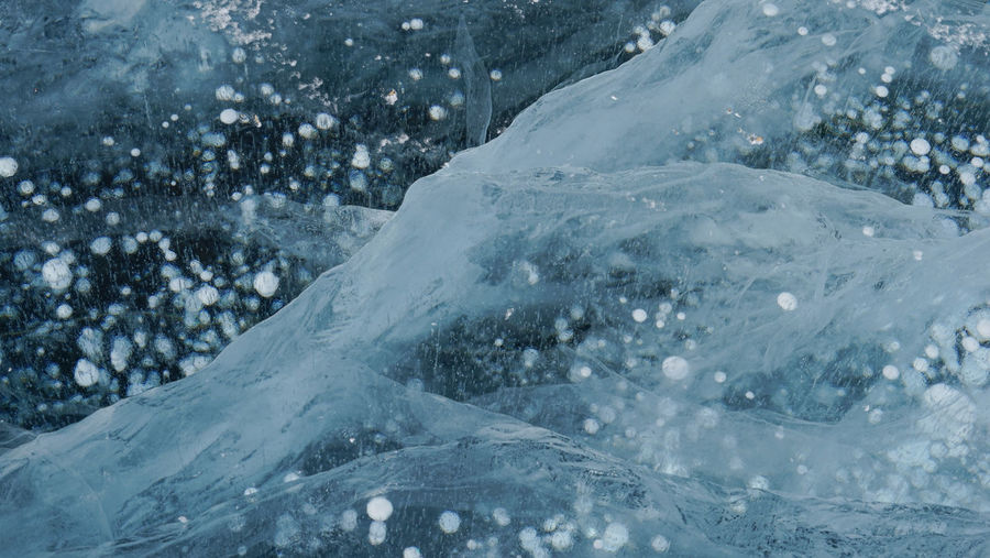 Unique ice with bubbles lake baikal. russia.