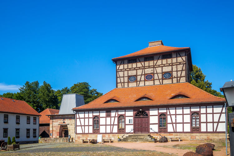 Traditional building against clear blue sky