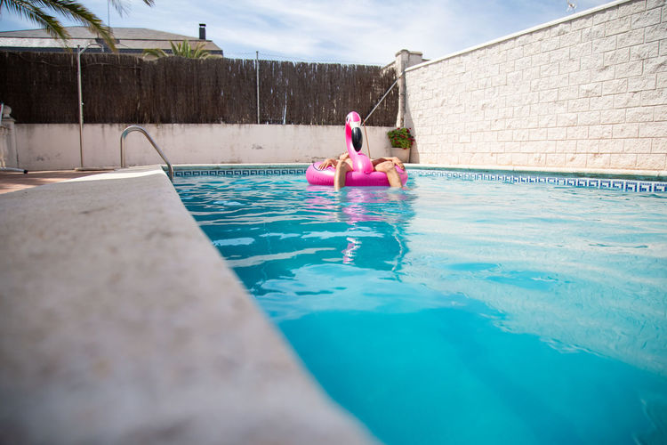Woman swimming in pool