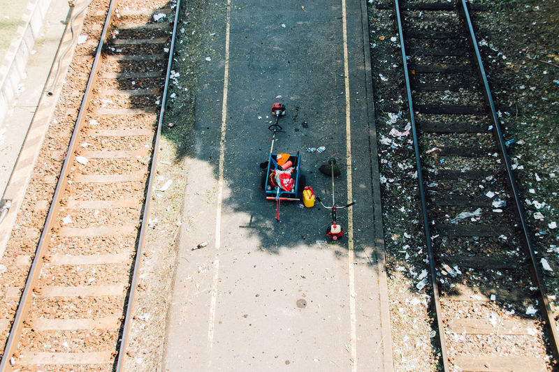 High angle view of equipment in toy wagon amidst railroad tracks