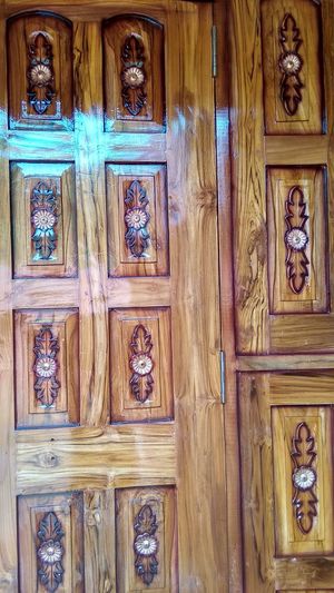 Full frame shot of old wooden door in building