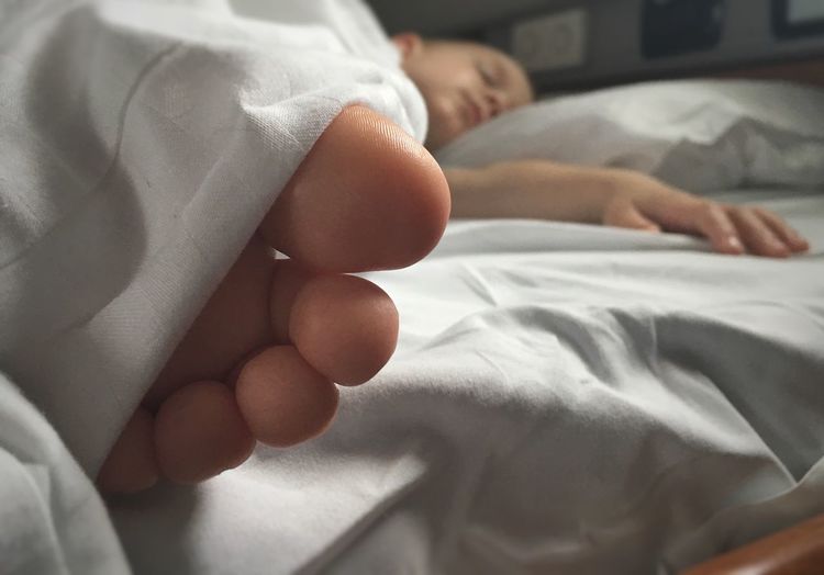 Close-up of the foot of a child sleeping