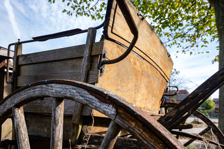 Rear of an old horse-drawn carriage no longer in use.