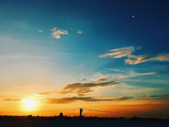 Scenic view of silhouette landscape against sky during sunset