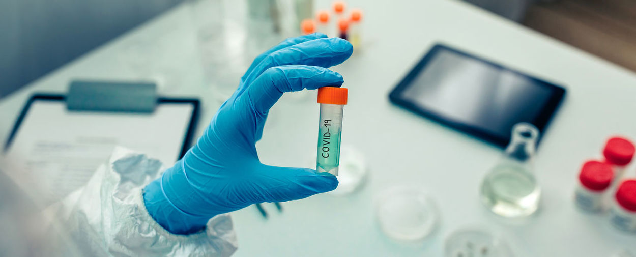 Cropped hand of scientist holding test tube