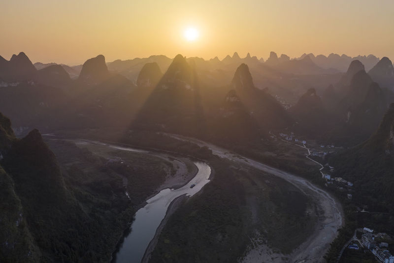 Aerial view of mountains during sunrise
