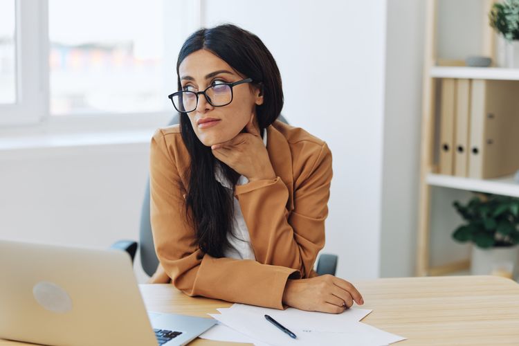 Businesswoman working at table
