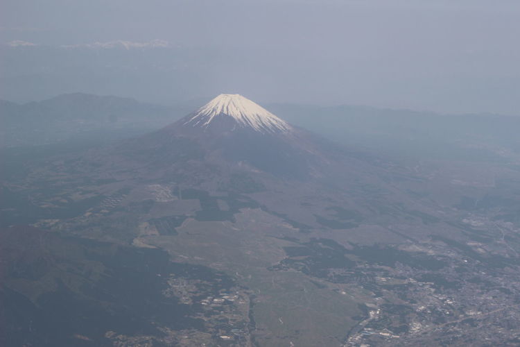 Aerial view of volcanic landscape against sky