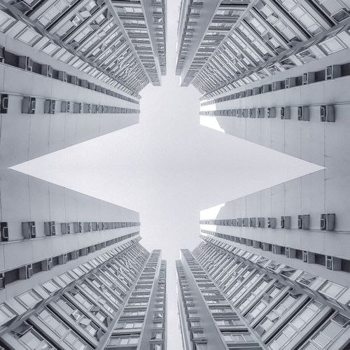 Digital composite shot modern building against clear sky