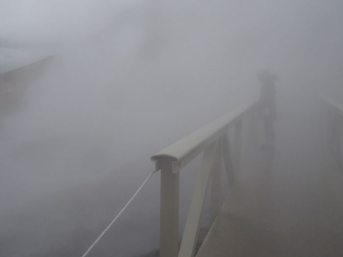 Suspension bridge in foggy weather
