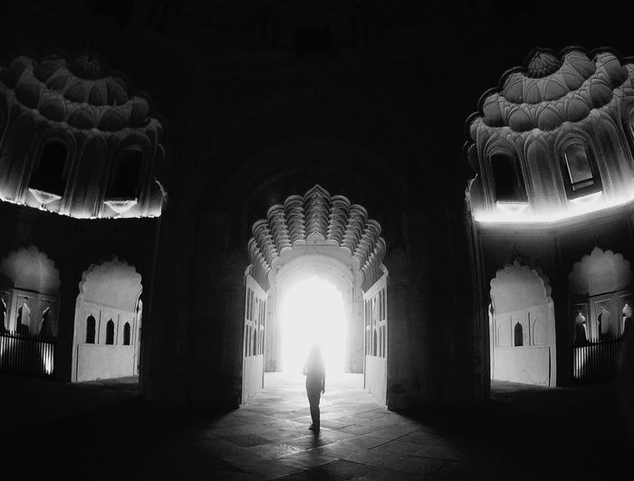 Woman standing at entrance of bara imambara