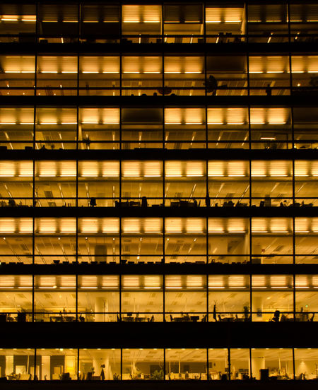 Full frame shot of illuminated office building
