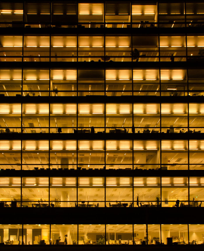 Full frame shot of illuminated office building