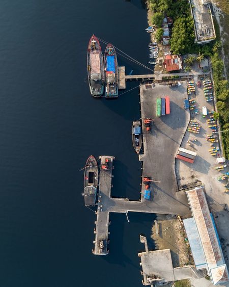 Aerial view of boats moored at harbor