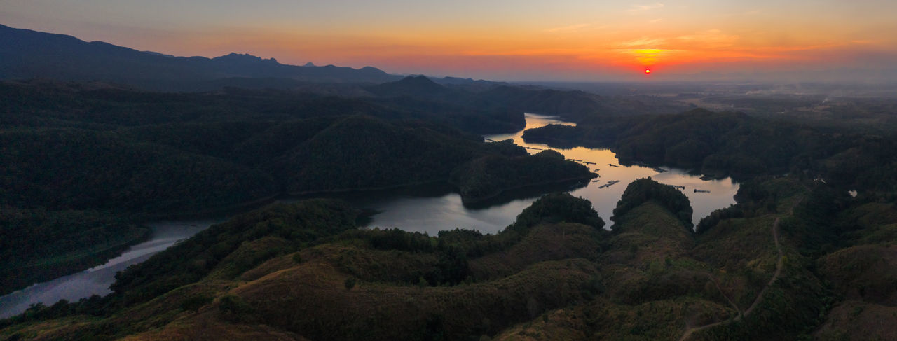 Scenic view of mountains against sky during sunset