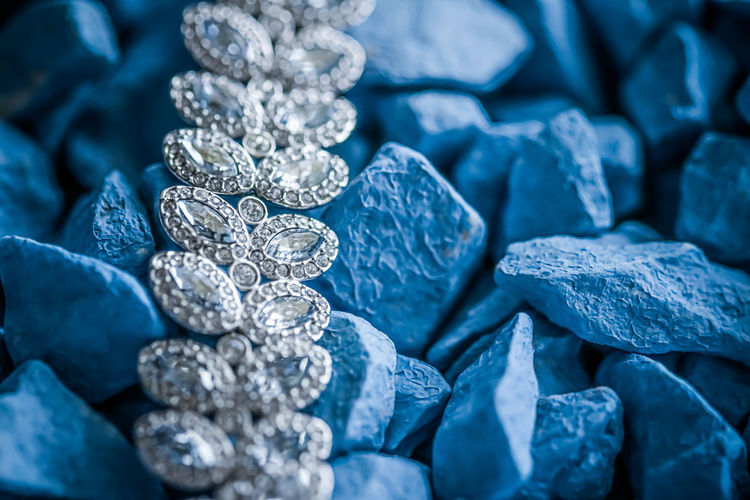 Full frame shot of jewelry on stones