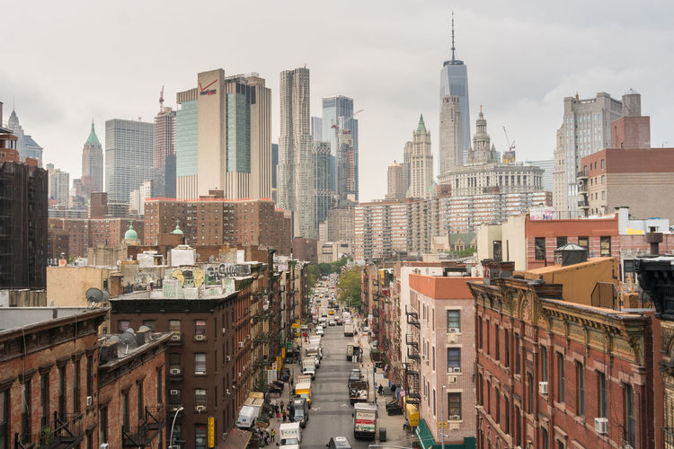 Walking among the skyscrapers of new york during a cloudy day