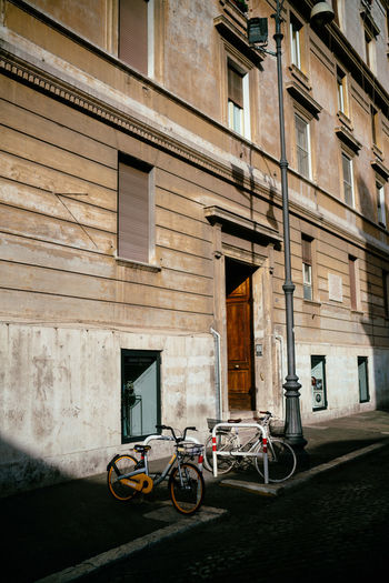 Bicycle parked outside building
