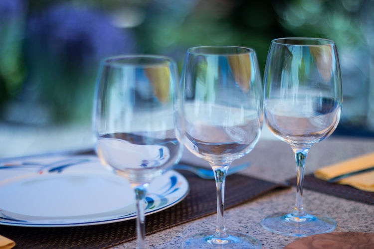 Glass of wine glasses on table