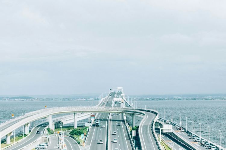 Tokyo bay aqua-line over sea against sky