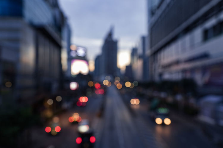 Defocused image of illuminated city street
