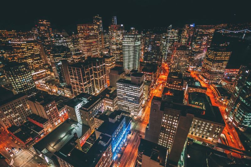 Aerial view of illuminated cityscape at night