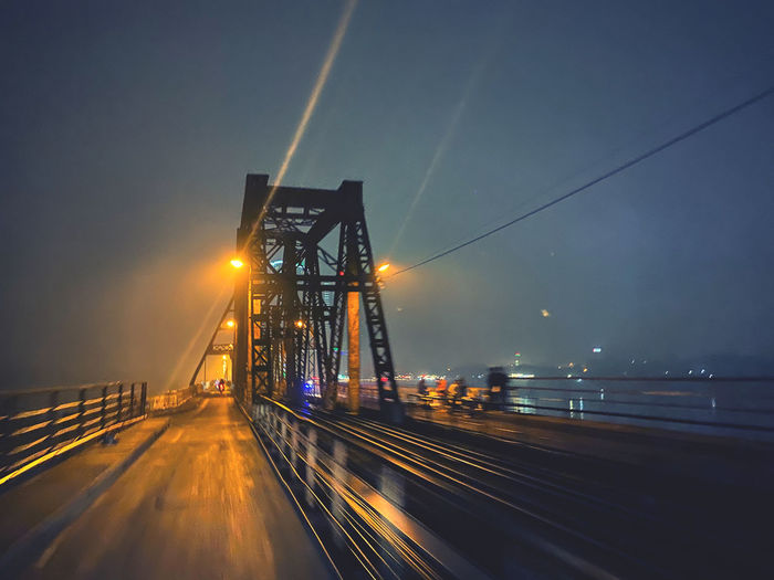 Long bien bridge at night - the eyewitness of hanoi city movement since 1989 