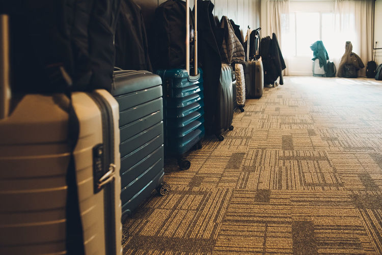 View of suitcases on floor at home