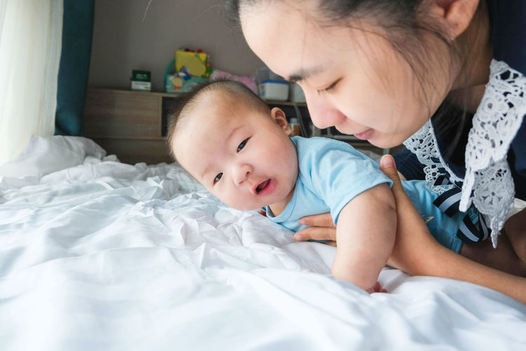 Woman playing with baby boy