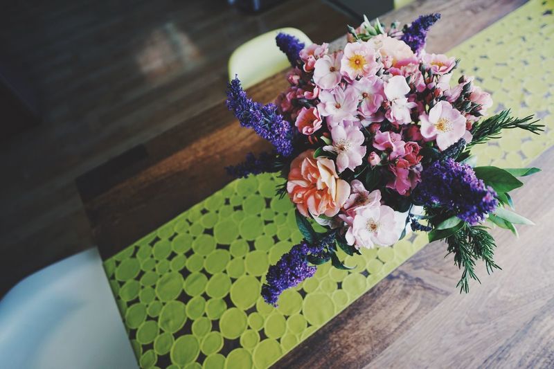High angle view of purple flowers on table